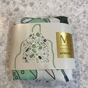 NWT Modern Expressions apron, white with light green/black kitchen tools.
